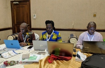 Periodistas africanos trabajando en un evento comunitario. Foto: SJN